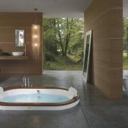 Bathroom set featuring inset whirlpool bath
