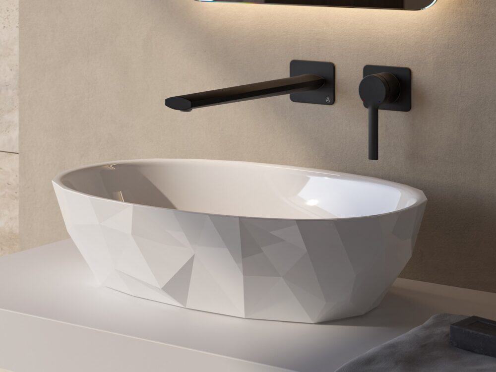 Adamsez Geo faceted AdCast Stone countertop basin with a matt black wall-mounted mixer