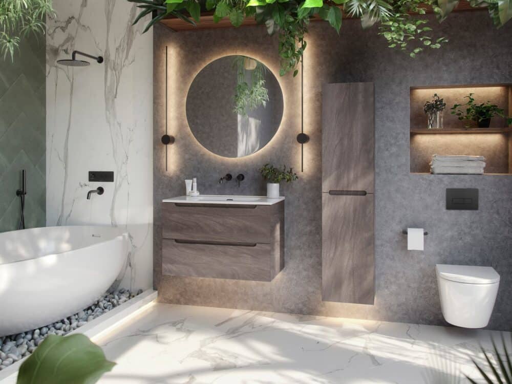 Armera Atoll vanity and tall unit with a round backlit mirror, freestanding bath and wall-hung WC in a marble bathroom