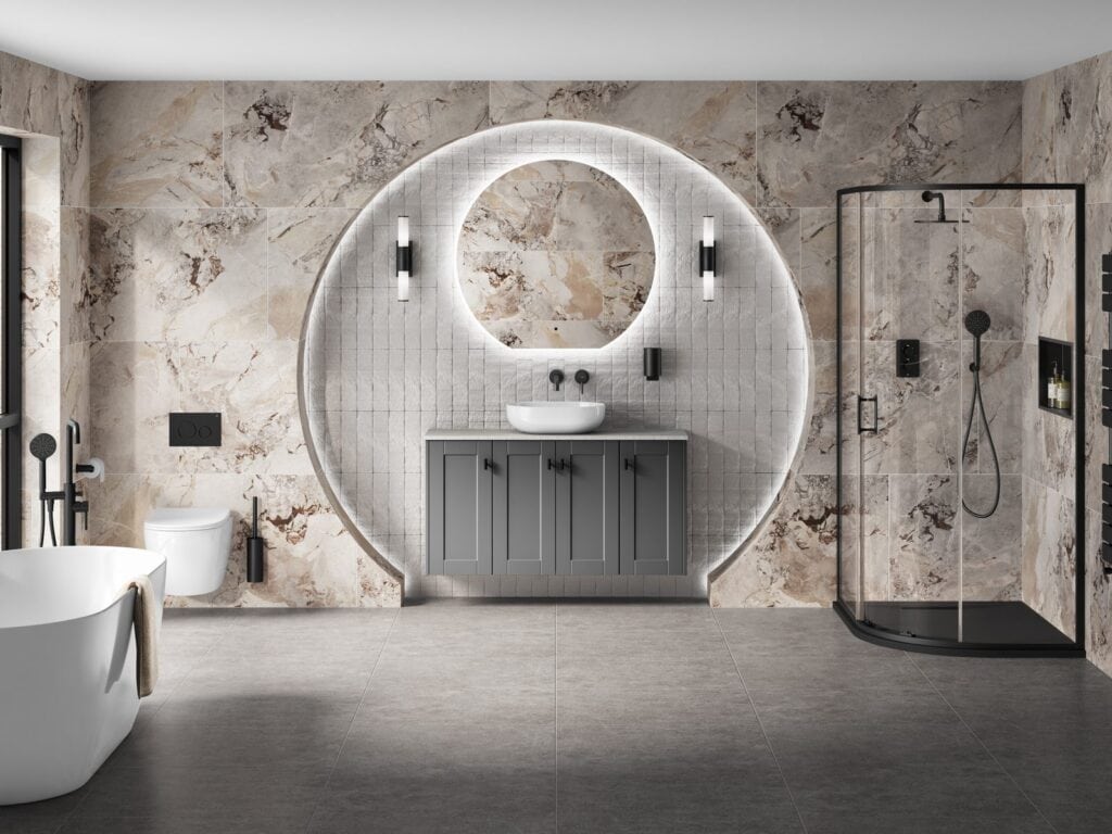 Complete bathroom with freestanding bath, vanity unit, mirror and heated towel rail