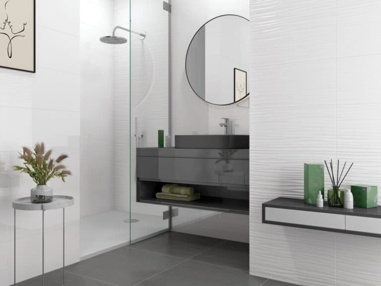 A white gloss tiled shower and basin wall