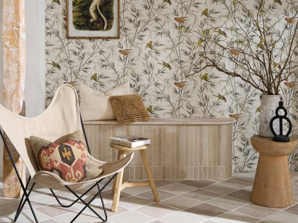 A chequerboard porcelain floor in a room with a floral wall