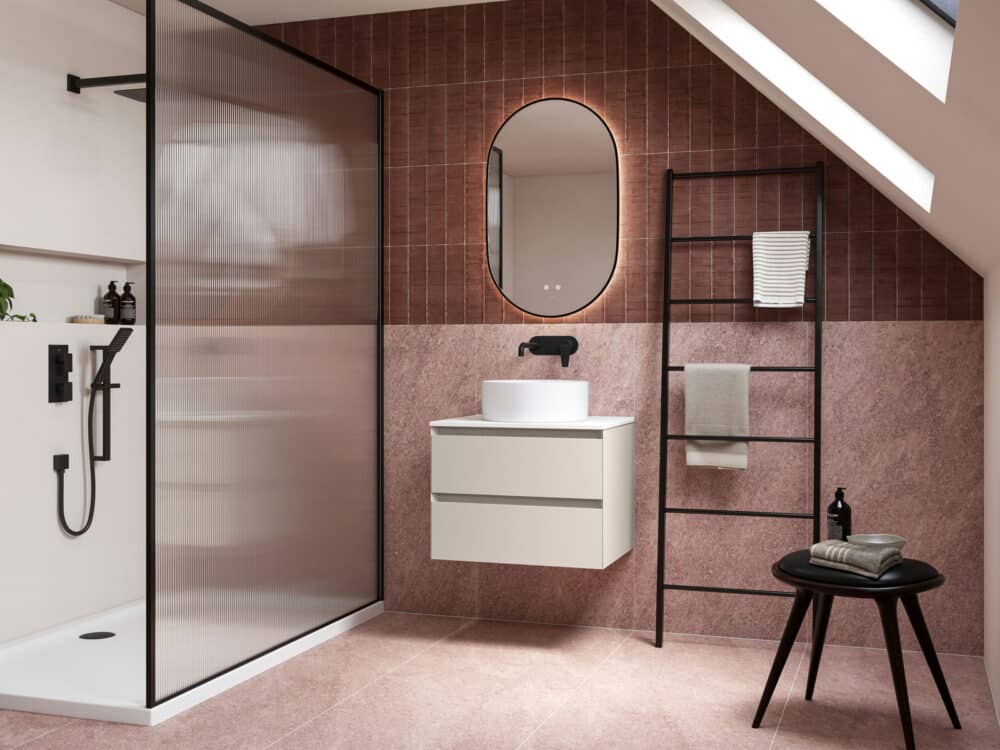Calypso Brenta wall-hung vanity with a countertop bowl against terracotta tiles beside a walk-in shower