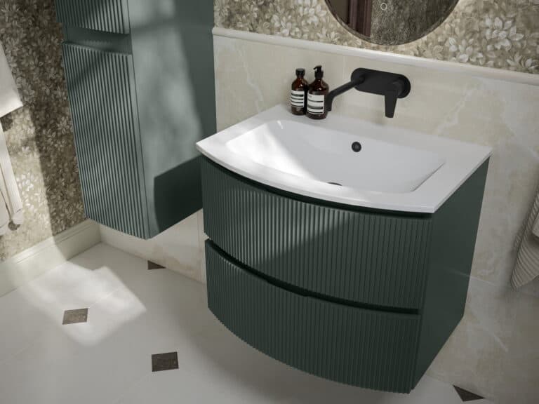 Calypso Levanto wall-hung vanity unit in fir green with a fluted front, curved basin and matt black mixer