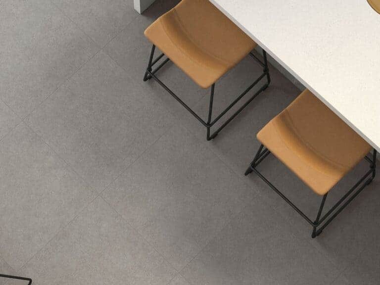 Craven Dunnill Revere Jade marble-effect floor tiles with green and black veining below a concrete twin trough basin