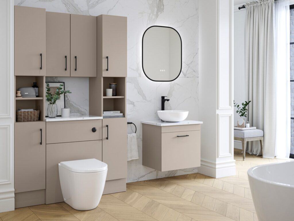 Fitted bathroom furniture in stone with tall storage and a wall-hung vanity