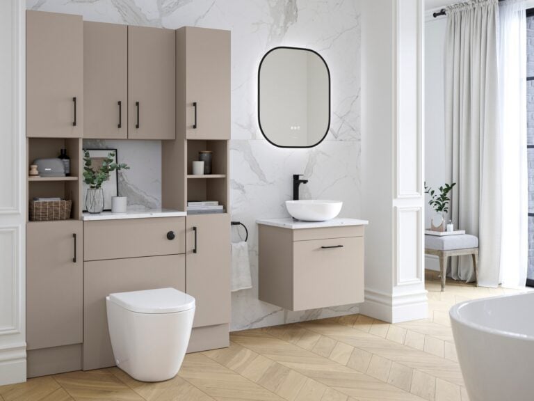 Fitted bathroom furniture in stone with tall storage and a wall-hung vanity