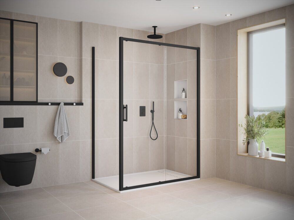 Flair ILI framed sliding door and side panel in matt black beside a wall-hung WC