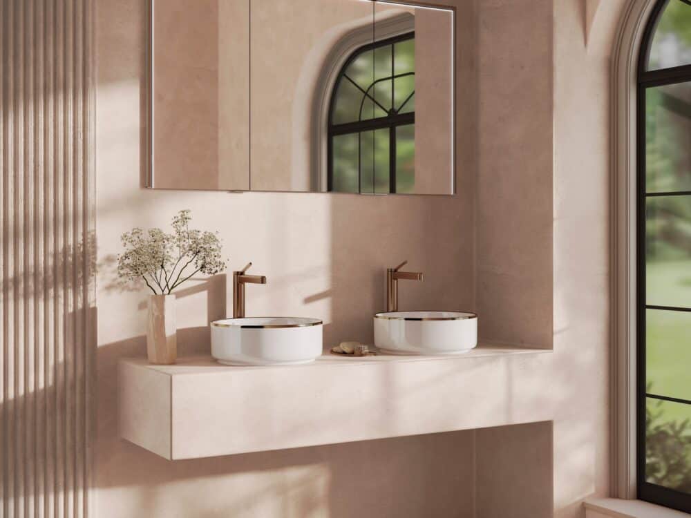 HiB Odelle recessed mirror cabinet with twin countertop basins and brushed bronze taps