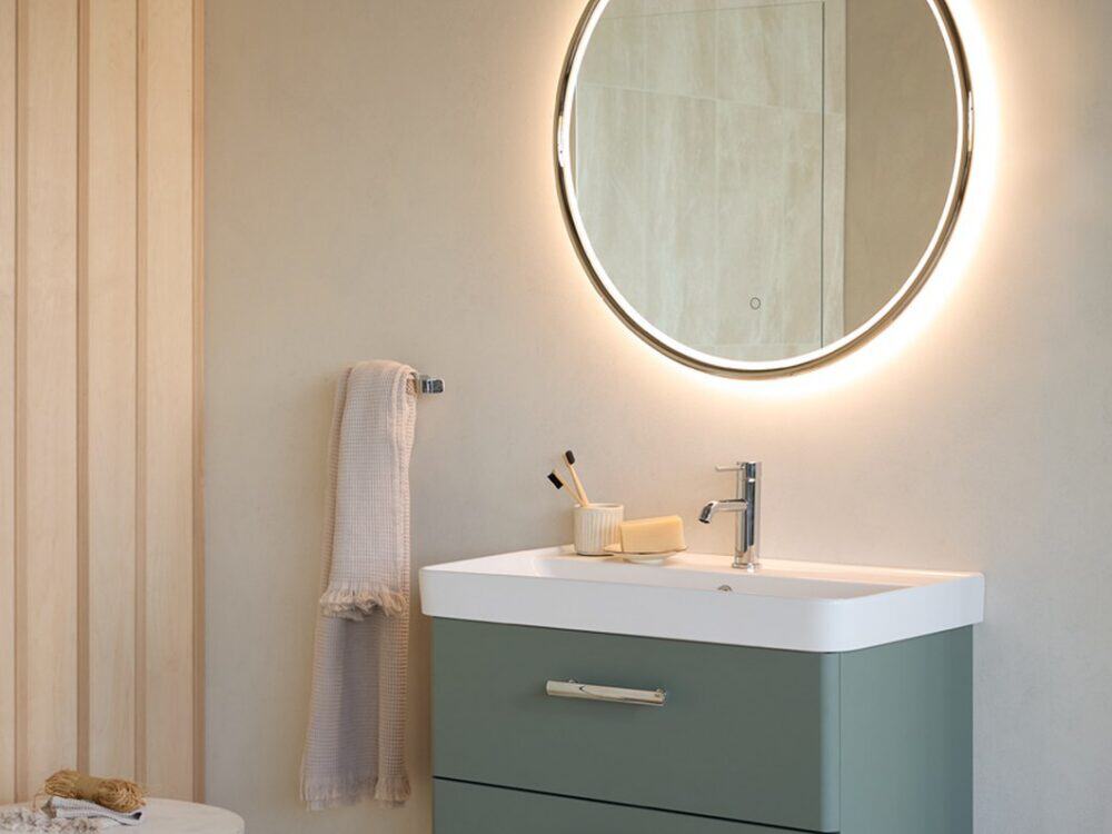 hib.inspire Wicklow 85 wall-hung basin unit in Eucalyptus Green below a Celeste round LED mirror