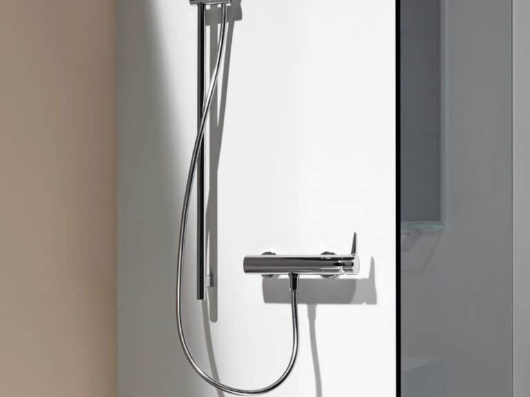 Laufen chrome exposed shower valve with a slide rail and handset