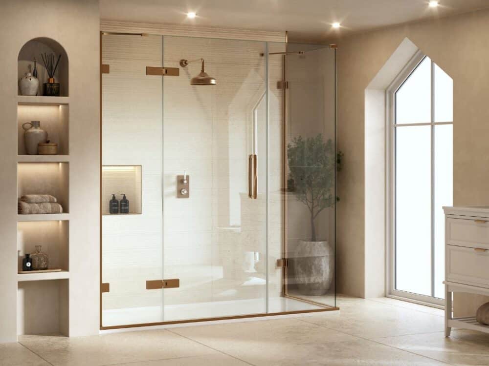 Merlyn Arysto Ten shower enclosure in a marble bathroom with an arched window