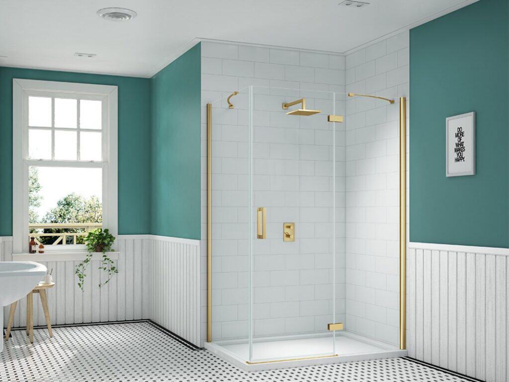 Merlyn Ionic Essence shower enclosure with gold fittings against a teal wall