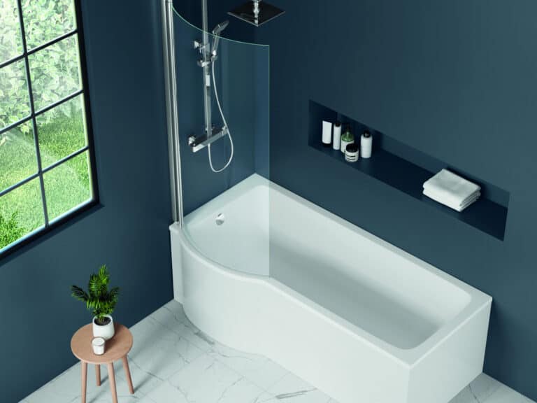 MyLife Sena L-shaped shower bath with a chrome bath screen and overhead shower against a navy wall