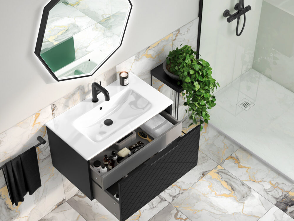 MyLife Bonita Lounge black vanity with an open drawer and octagonal mirror against marble tiling