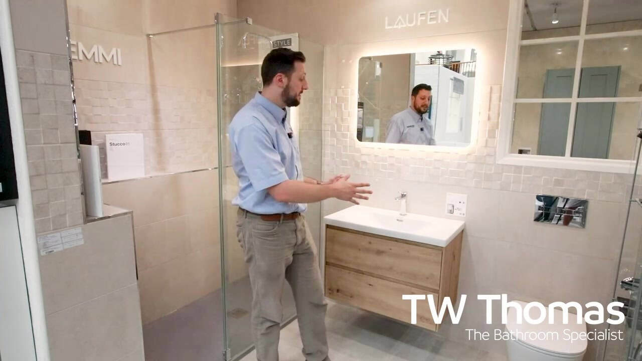 A still from the TW Thomas video Larry on a modern wall-hung display