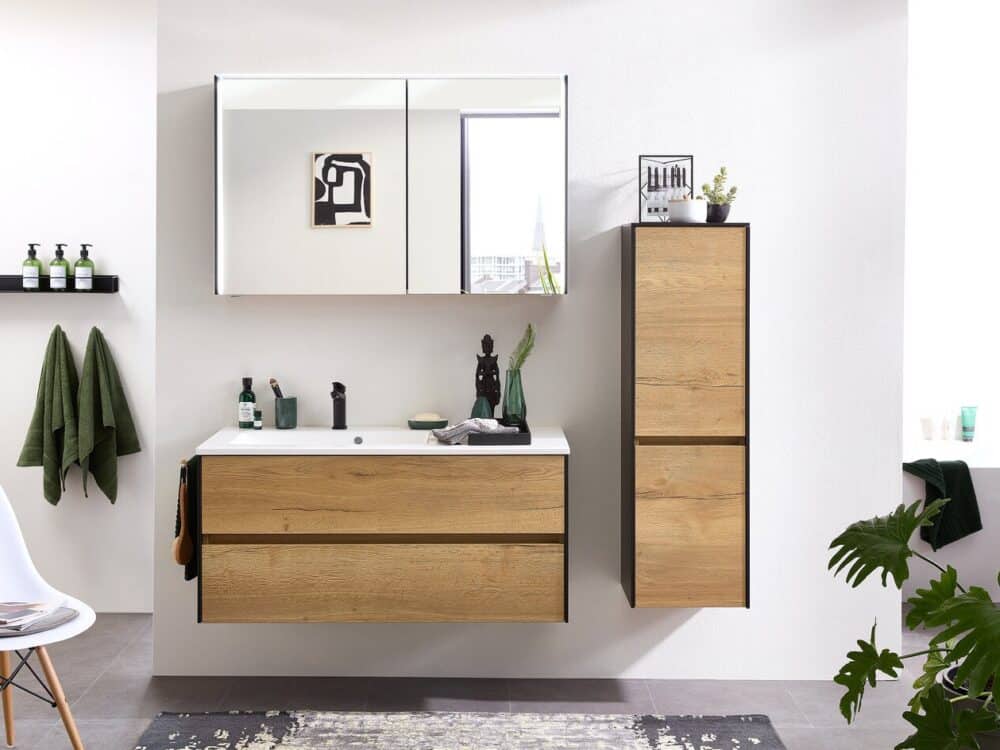 Pelipal wood and white vanity unit with a tall side cabinet and mirror cabinet