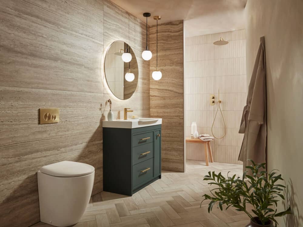 Roper Rhodes Concierge vanity unit in juniper green with a Ritual illuminated mirror and a walk-in shower