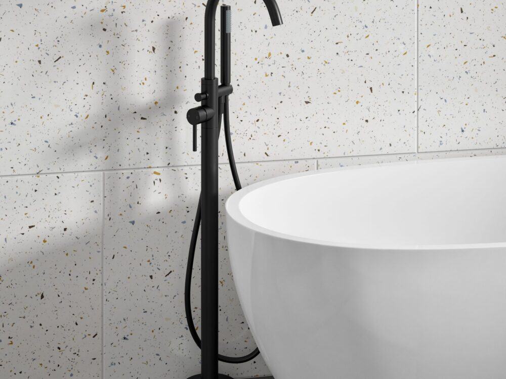 MyLife Avon floor-standing bath shower mixer in black in a bathroom setting
