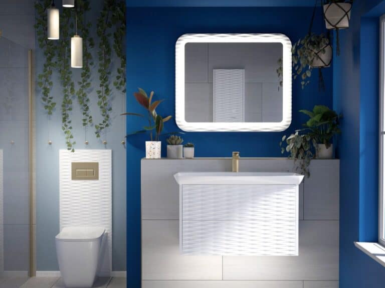 Utopia illuminated bathroom mirror above a wall-hung vanity unit