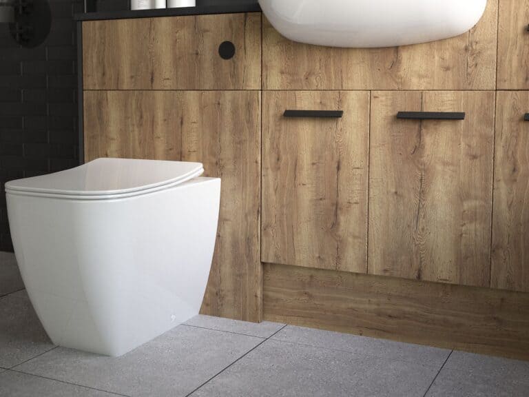 Utopia back-to-wall WC set into Dorchester Oak fitted furniture