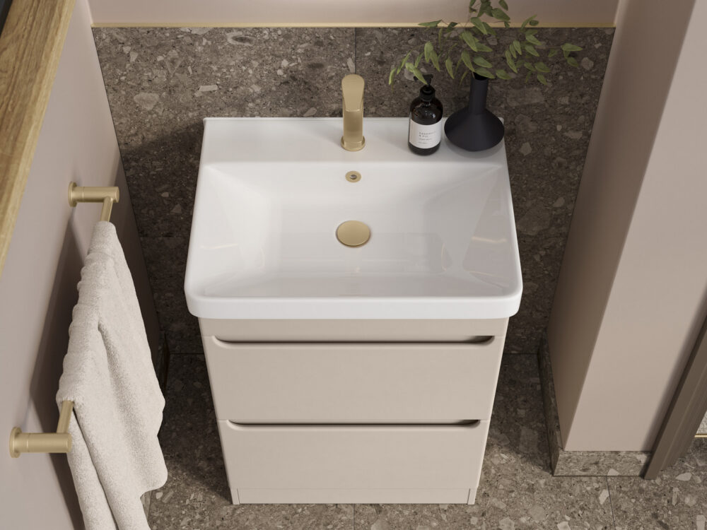 Veldeau Byford soft sand wall-hung vanity unit with a brushed brass tap and round mirror