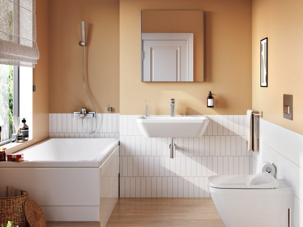 VitrA Neon corner bath with a wall-hung washbasin and bidet against white metro tiles