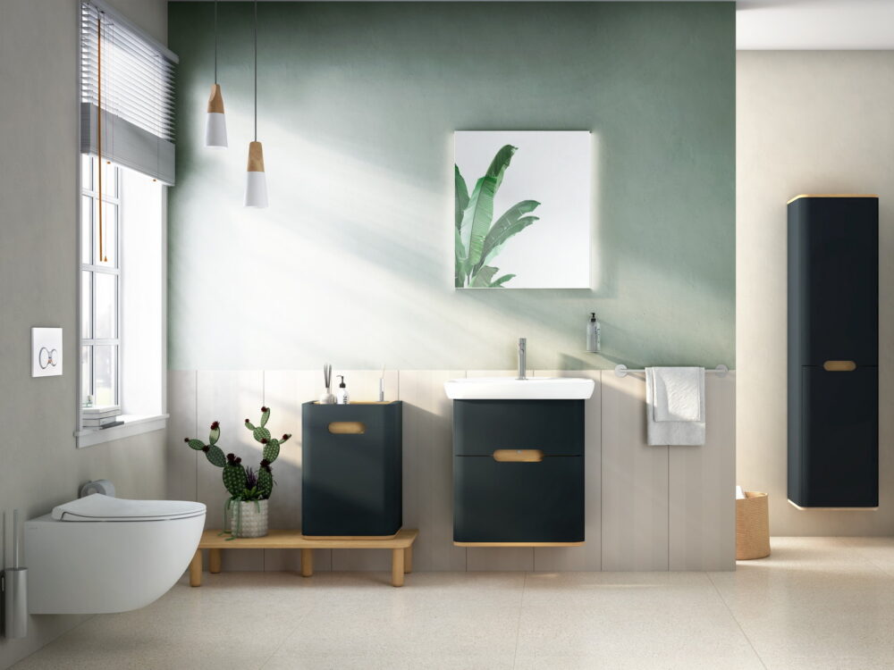 VitrA Sento navy wall-hung vanity units and tall unit with a wall-hung WC against a green wall