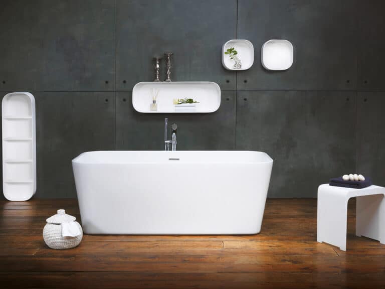 Waters Curve shelf, soap dish and Companion stool in a dark panelled bathroom beside a freestanding bath
