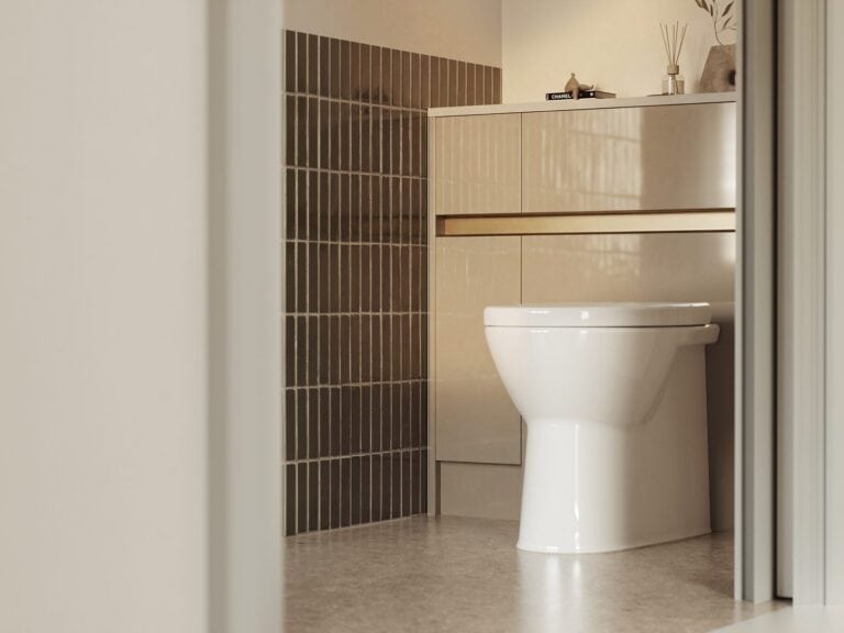 Back-to-wall toilet set into fitted bathroom furniture